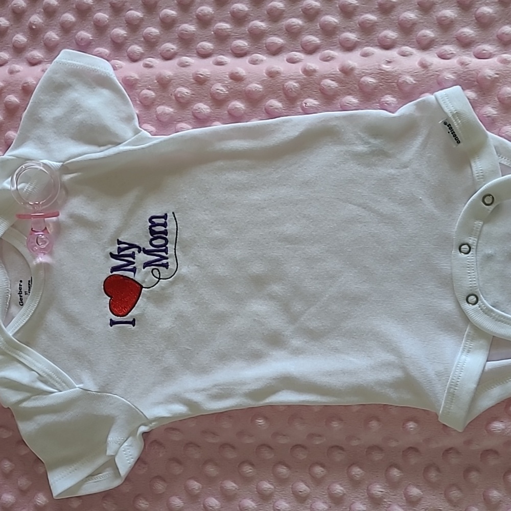onesie  new  white with "I love Mom embroidered on it